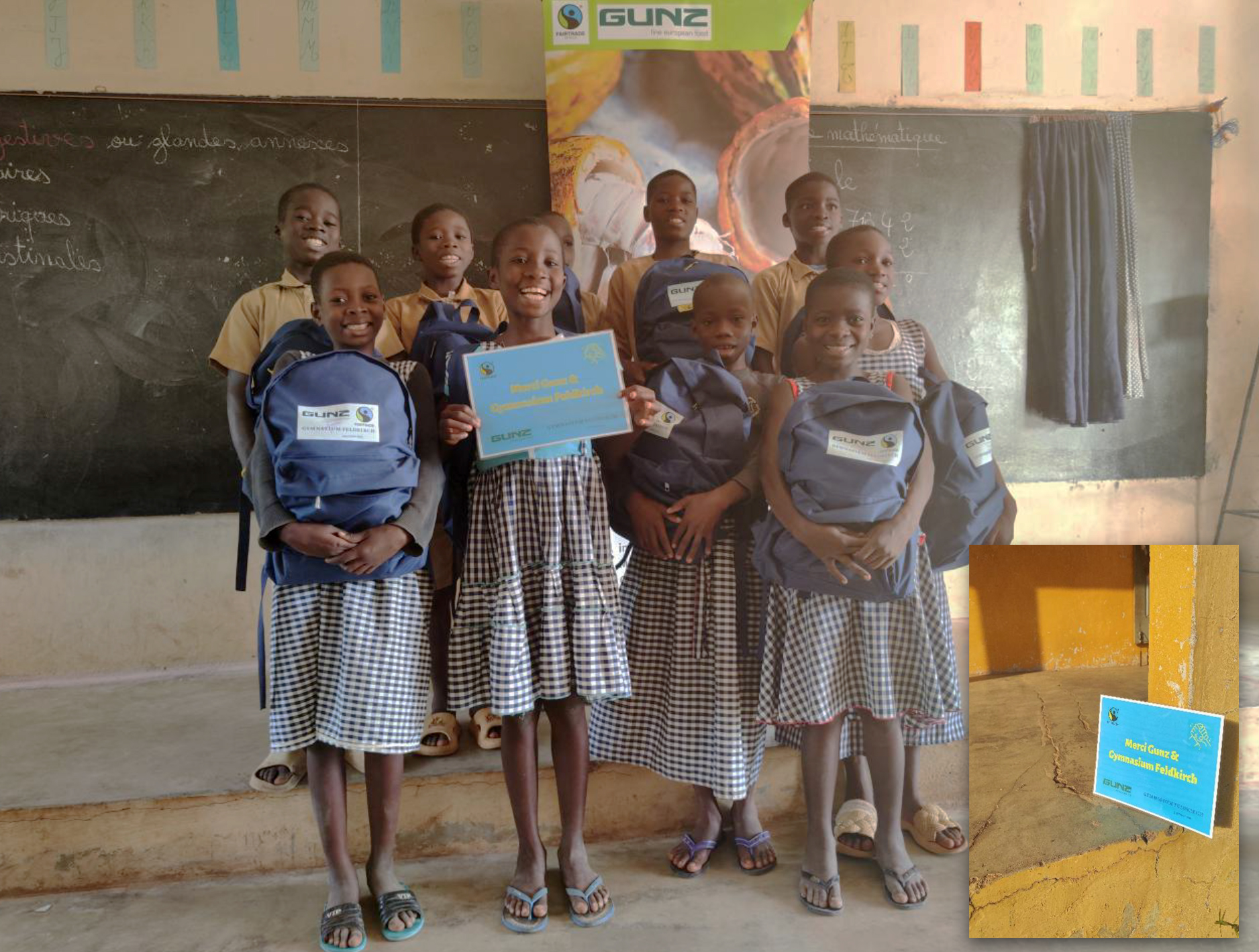 Kinder mit gespendeten Gunz-Rucks&auml;cken in Klassenzimmer
