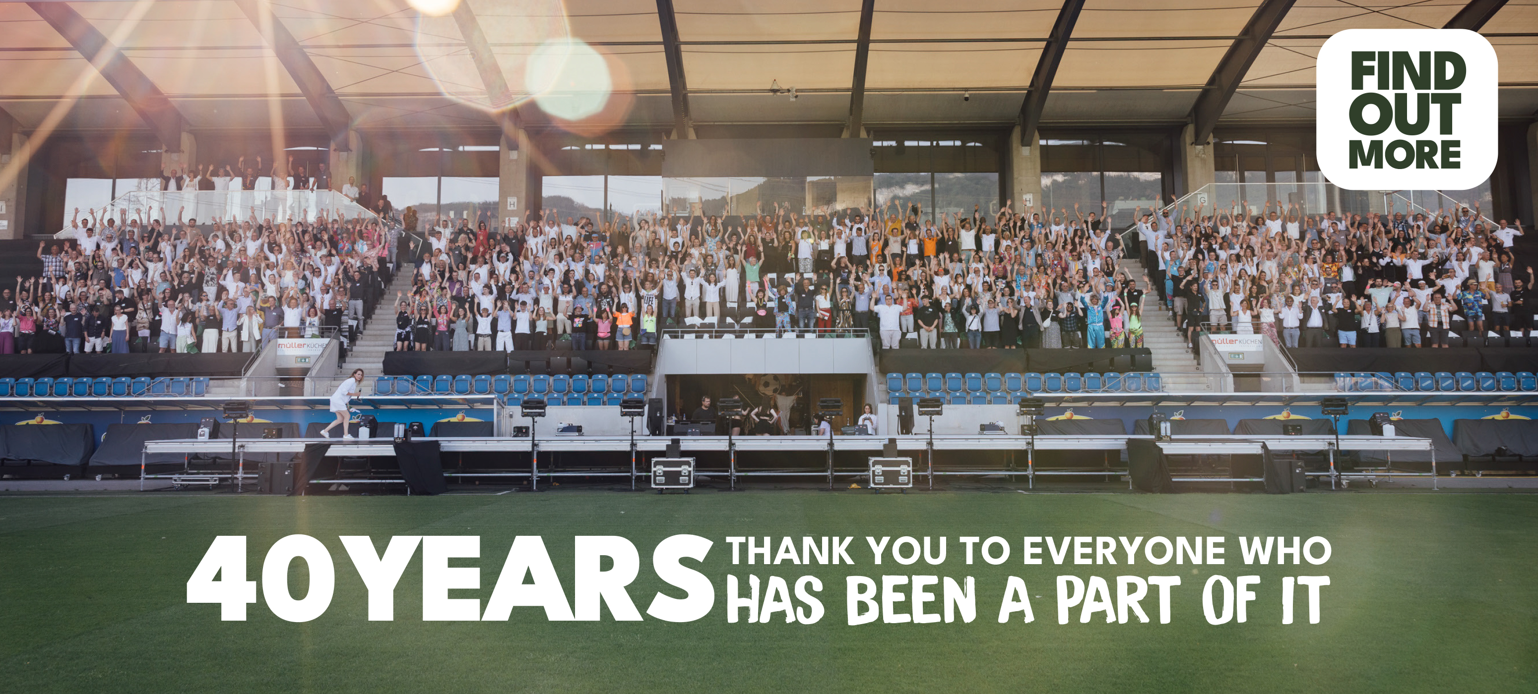 Crowd on grandstand for 40th anniversary