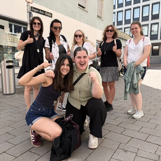 Happy apprentices and their mentors during the outdoor escape game